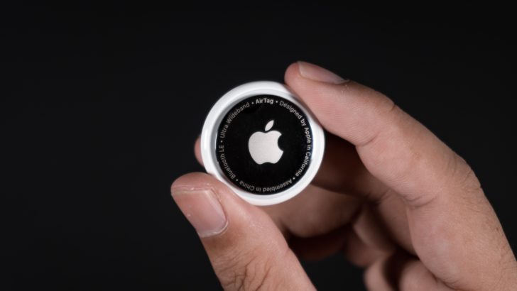 Photo of person holding airtag