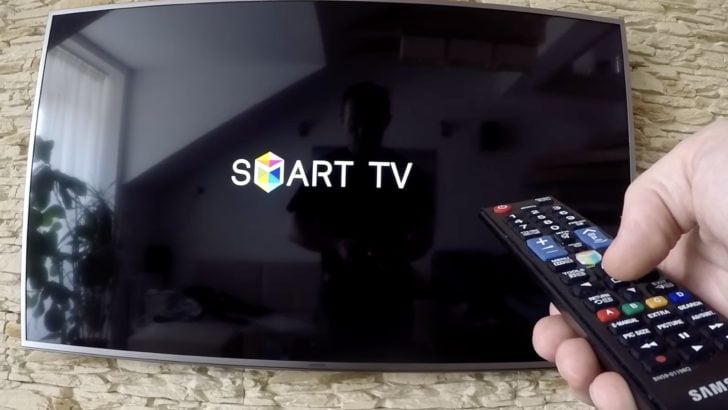 Photo of person doing a samsung tv soft reset