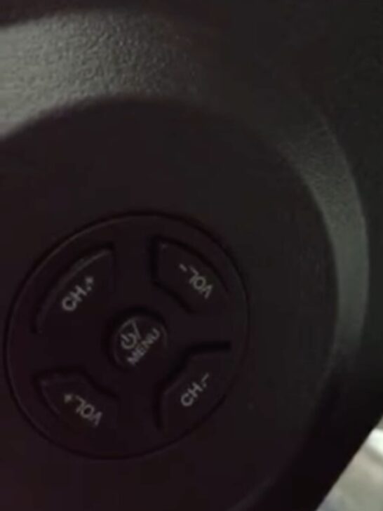 Photo of jog controller on the back of tcl roku tv