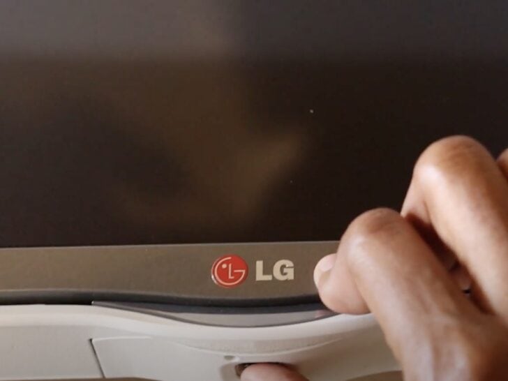 Photo of person doing a power cycle on lg tv