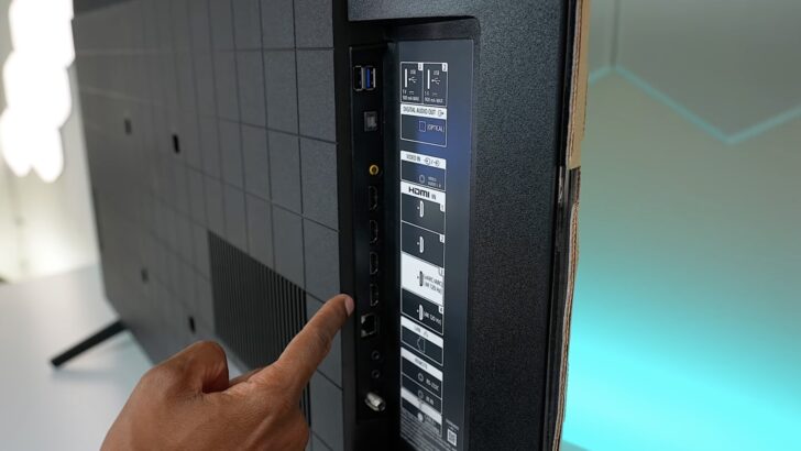 Photo of person checking several hdmi ports on a sony smart tv