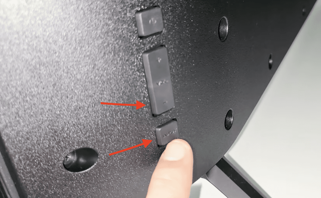 Photo of the buttons at the back of a Vizio TV used for resetting it without a remote