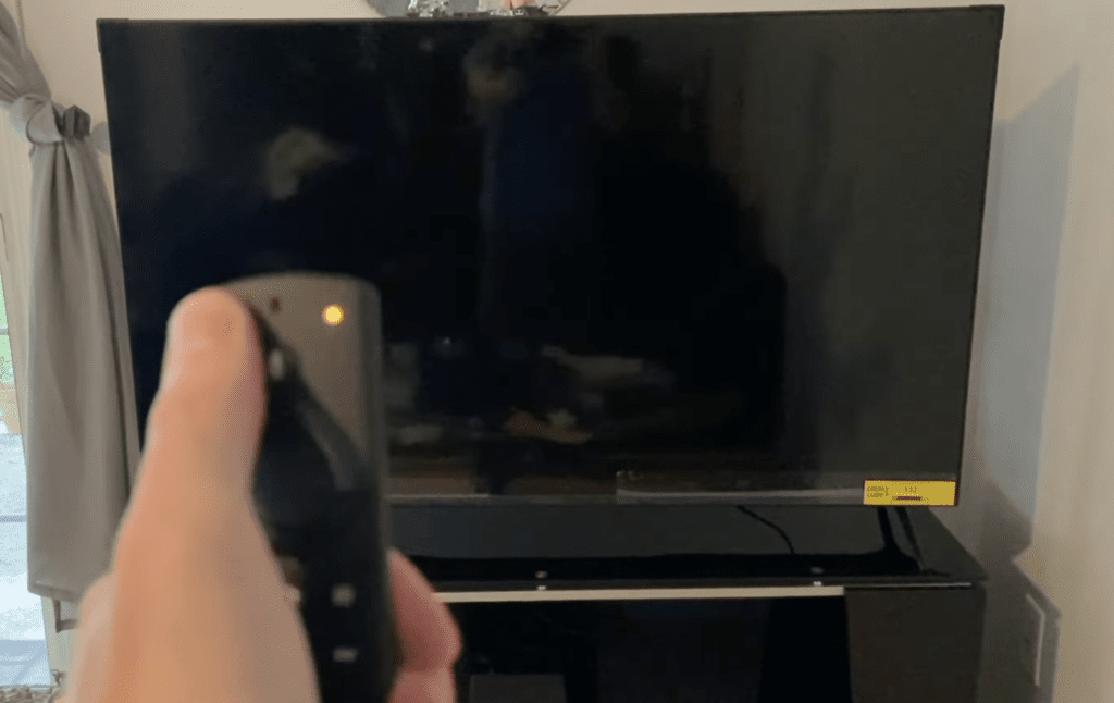 Photo of a person with an Insignia TV that won't turn on