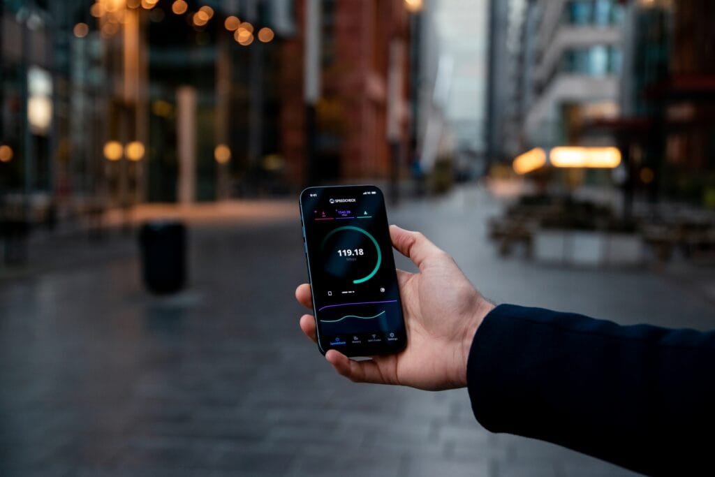 Photo of someone checking the internet speed using a smartphone