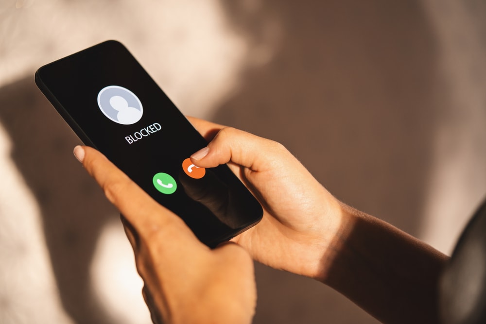 Woman blocking incoming call