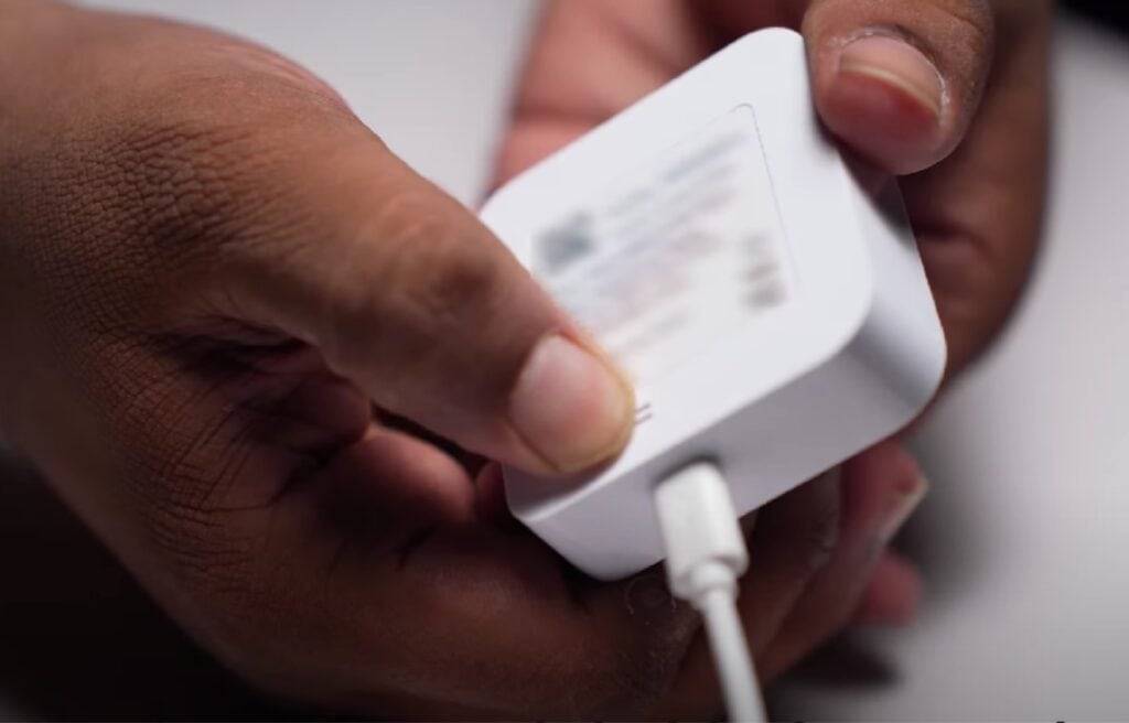 Pressing the reset button on a  Sync Module