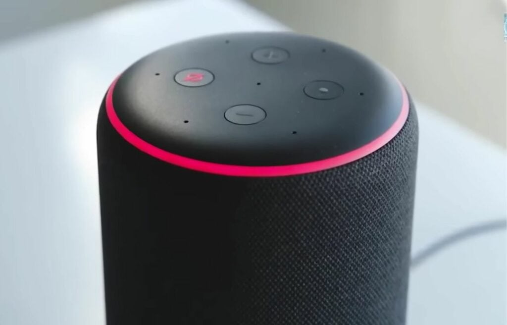 An Alexa speaker showing red light on the light indicator