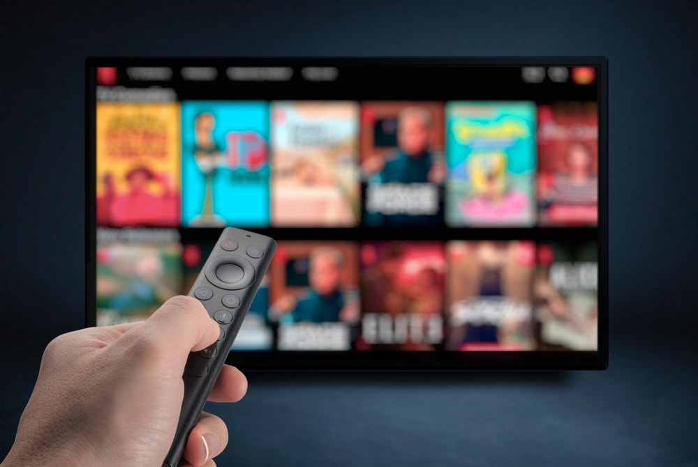 a remote  pointed on a TV
