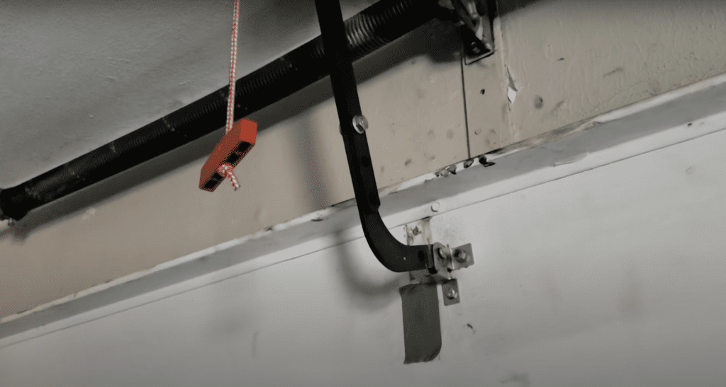 Hollow block holding the garage door open
