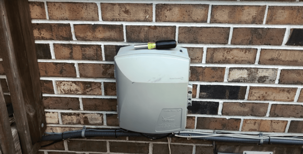 Verizon ONT attached on the brick wall